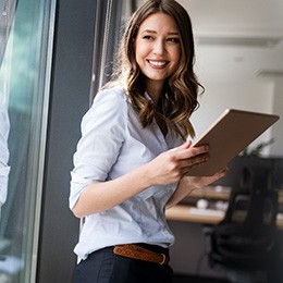 Confident, smiling woman in professional setting