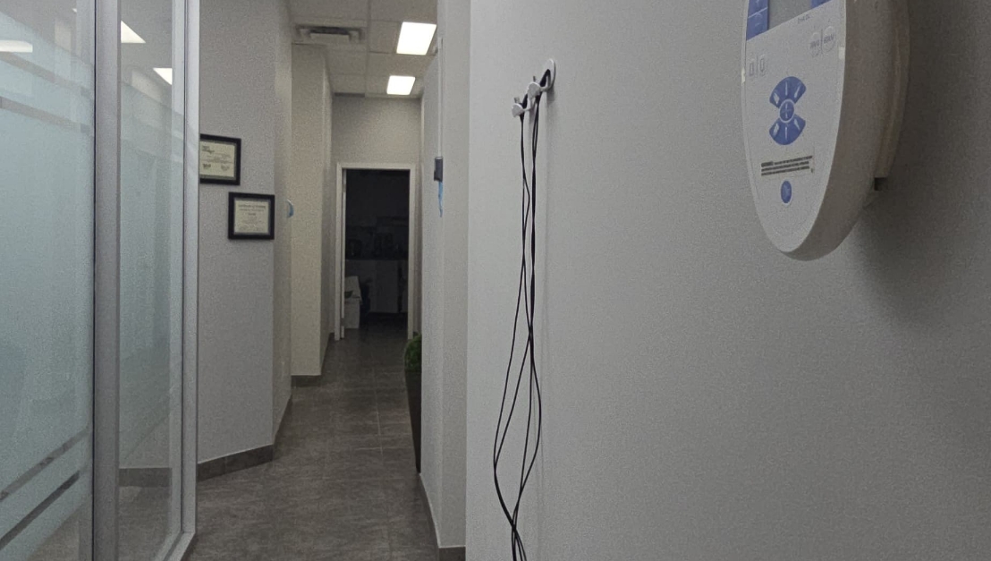 Clinical hallway and treatment room access at Fisher Dental