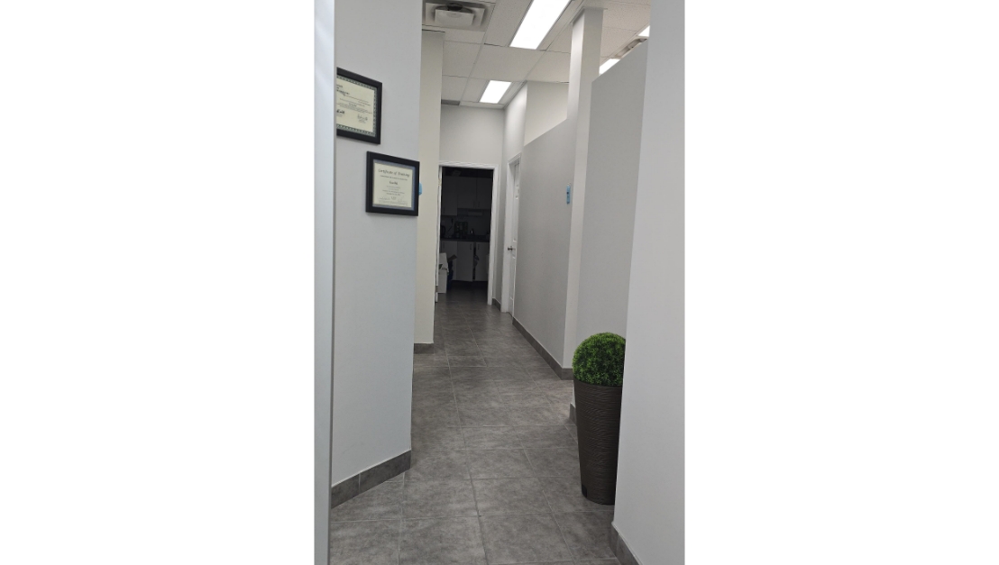 Hallway leading to treatment rooms at Fisher Dental