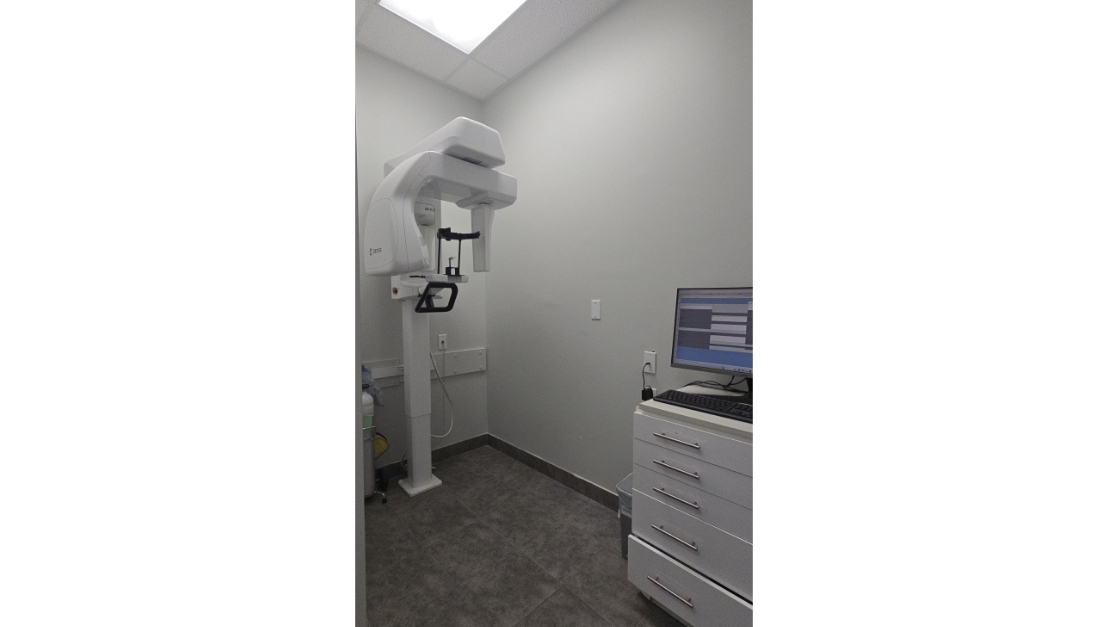 Dental treatment room with modern equipment at Fisher Dental