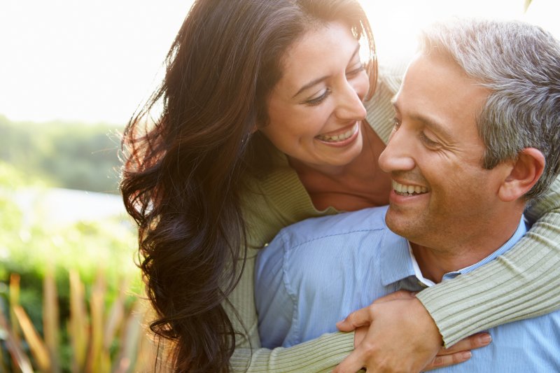 middle-aged couple smiling together